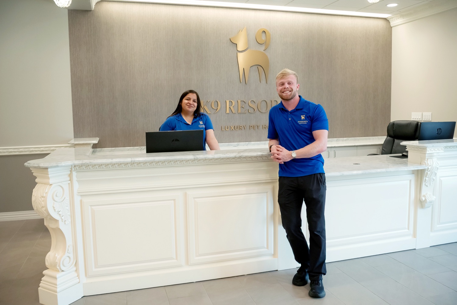 Zack Nisbet at the K9 Resorts Deerfield reception desk